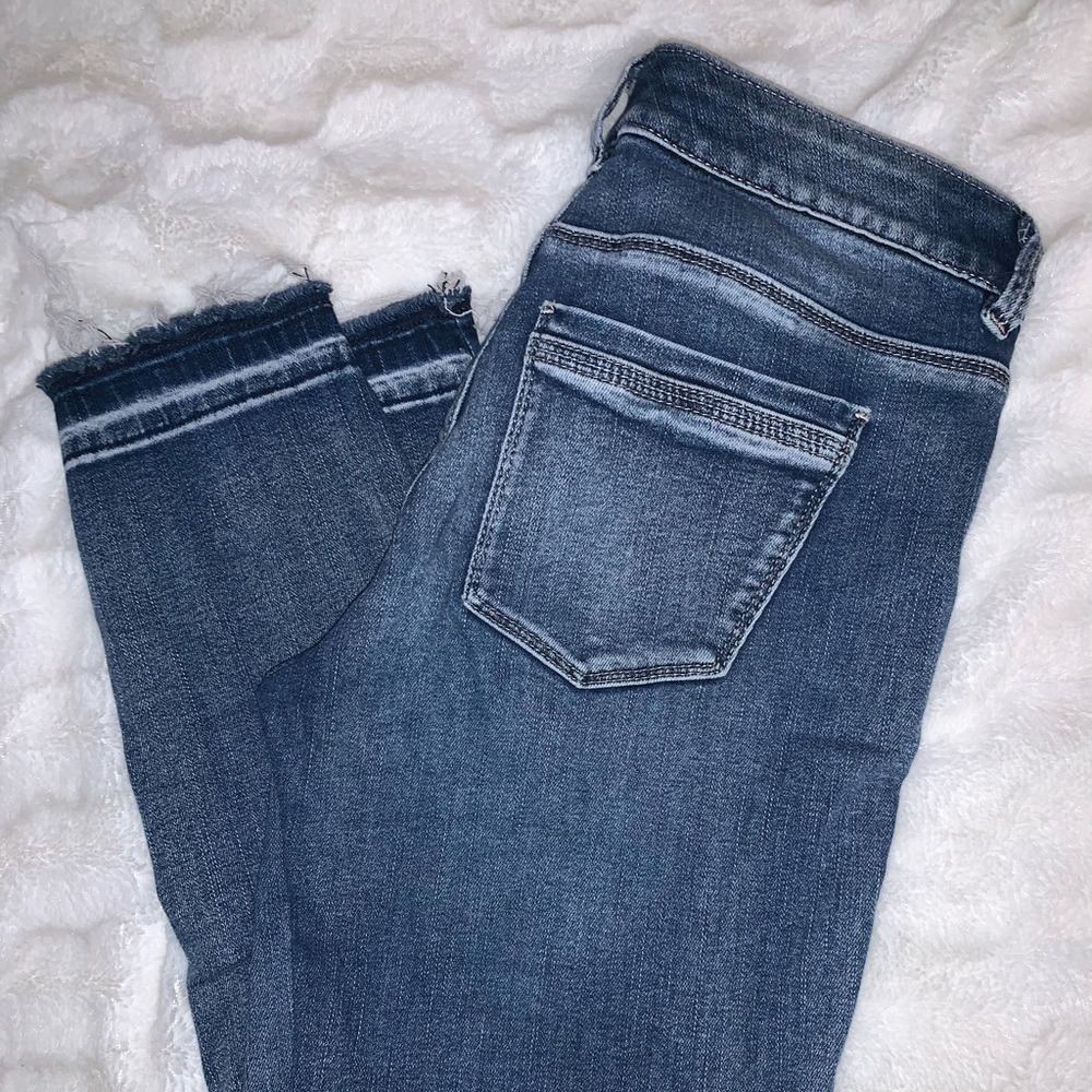 White House Black Market cropped raw hem denim!